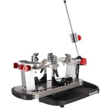 Gamma Momentum 6 Plus stringing machine – angled front-left view with drop-weight tension system and V-mount clamps