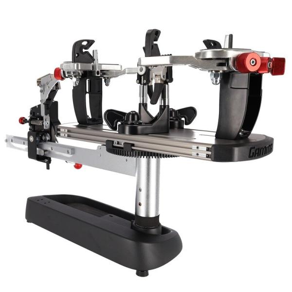 Gamma Momentum ST tabletop stringing machine in elevated three-quarter view with crank on the left