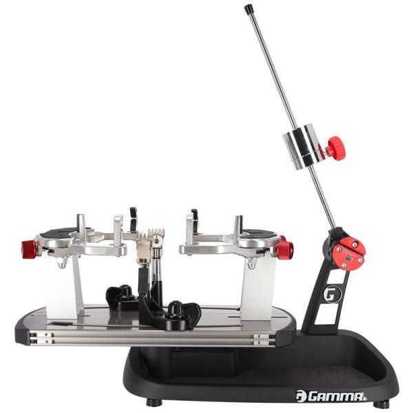 Side view of the Gamma Momentum 6 Plus stringing machine with 6-point frame fixation and drop-weight tensioning system